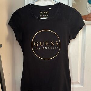 Black Guess shirt with gold writing